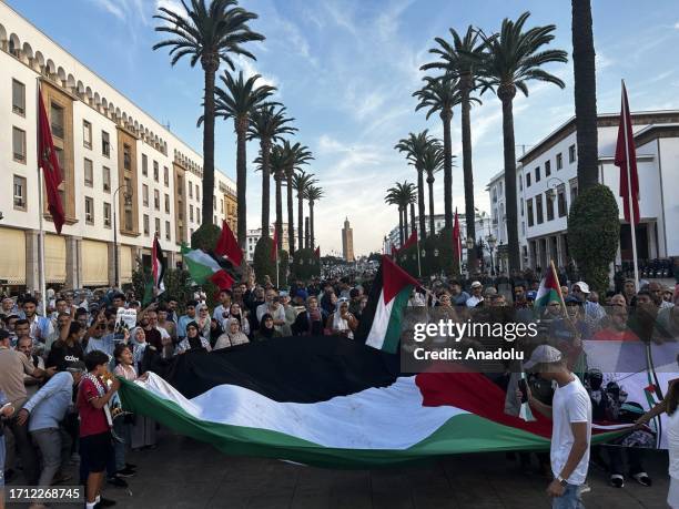 People stage a demonstration and carry Palestinian flag in support of Hamas and Palestinian resistance in Rabat, Morocco on October 07, 2023....