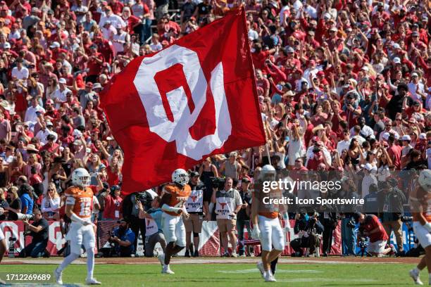 Oklahoma Sooners flag after a touchdown during the second half against the Texas Longhorns on October 7th, 2023 at Cotton Bowl Stadium in Dallas...