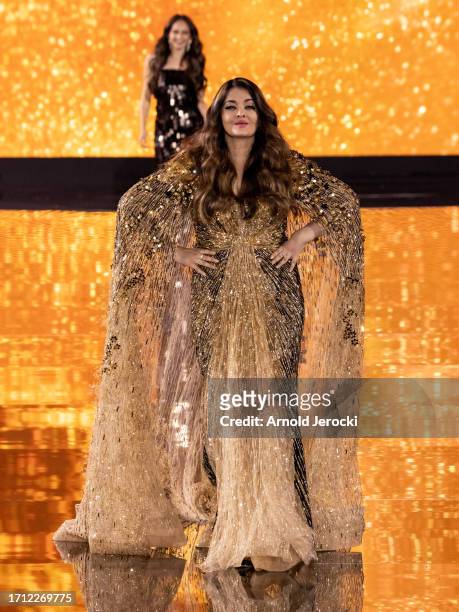 Aishwarya Raiwalks the runway during the "Le Defile - Walk Your Worth" - 6th L'Oreal Show as part of Paris Fashion Week at the Eiffel Tower on...
