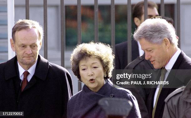 Canadian Prime Minister Jean Chretien, newly appointed Governor General Adrienne Clarkson, and US President Bill Clinton walk together prior to the...