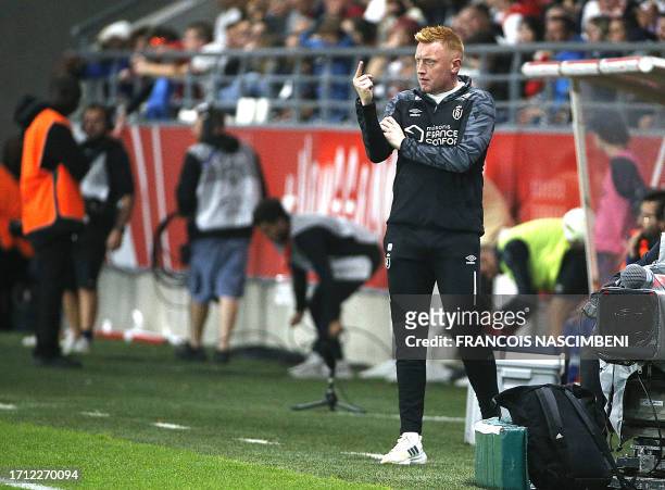 Reims' Belgian head coach Will Still reacts during the French L1 football match between Stade de Reims and AS Monaco at Stade Auguste-Delaune in...