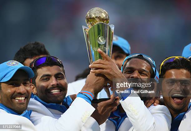 Shikhar Dhawan of India lifts The ICC Champions Trophy with Ravindra Jadeja after India beat England in the ICC Champions Trophy Final match between...