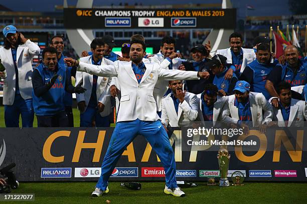 Virat Kohli of India dances in celebration during the victory ceremony following India's 5 run victory in the ICC Champions Trophy Final match...