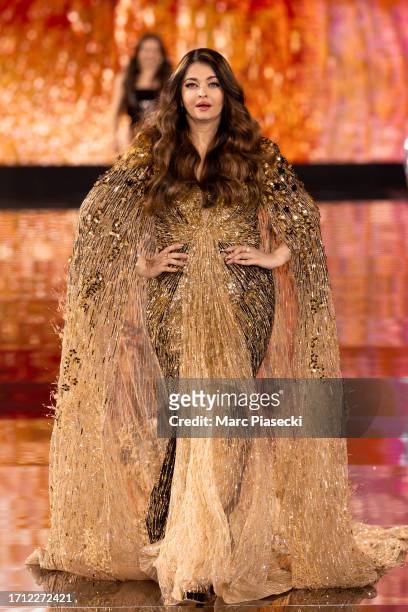Aishwarya Rai walks the runway during "Le Défilé L'Oréal Paris - Walk Your Worth" Show as part of Paris Fashion Week at the Eiffel Tower on October...