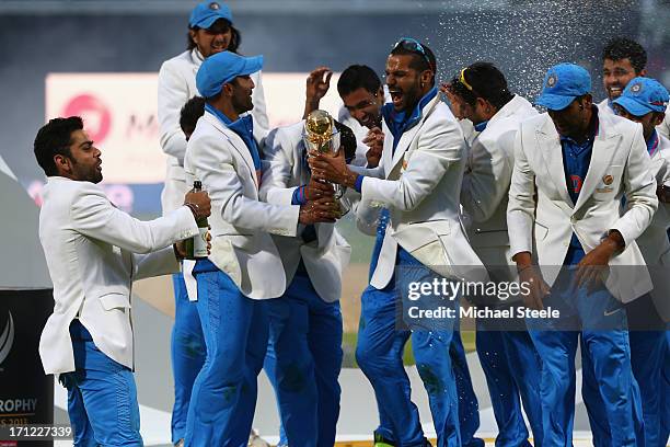 The India squad lift the winners trophy as they celebrate their 5 run victory during the ICC Champions Trophy Final match between England and India...