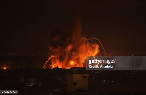 Smoke and flames rise after Israeli forces airstrikes as clashes continue between Israeli forces and Palestinian armed groups at various locations of...