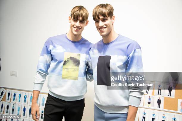 Models pose backstage at the Calvin Klein Collection show during Milan Menswear Fashion Week Spring Summer 2014 on June 23, 2013 in Milan, Italy.