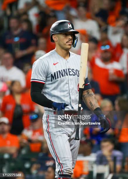 Minnesota Twins shortstop Carlos Correa reacts after striking out in the top of the sixth inning during the Major League Baseball ALDS Game 1 between...