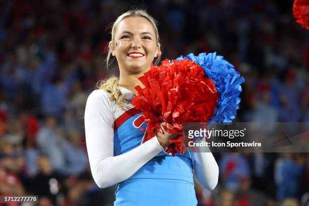 An Ole Miss Rebels cheerleader during the game between the Ole Miss Rebels and the Arkansas Razorbacks on October 7, 2023 at Vaught-Hemingway Stadium...