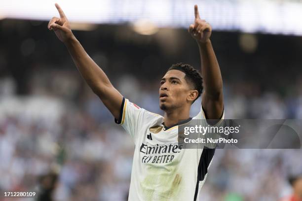 Jude Bellingham of Real Madrid celebrates a goal during the La Liga 2023/24 match between Real Madrid and Osasuna at Santiago Bernabeu Stadium.