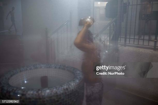 Young Iranian-Turk boy washes himself at a sauna in the Royal Park Hotel and SPA, in the city of Sarein, known as one of the most famous tourist...