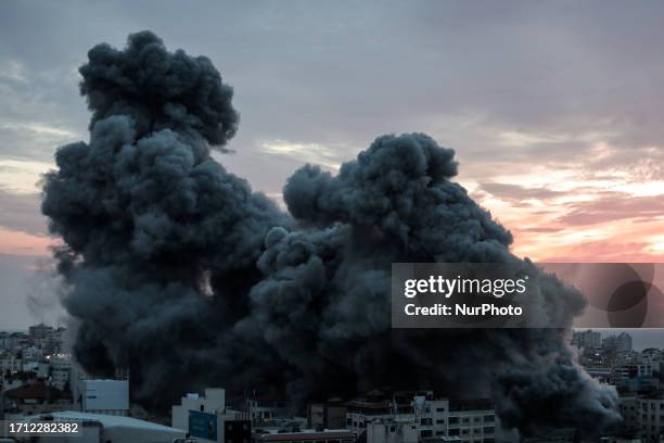 Smoke rises after bombing of Israeli forces with warplanes in Gaza City, October 7, 2023.