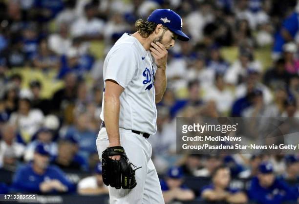 Los Angeles, CA Starting pitcher Clayton Kershaw of the Los Angeles Dodgers wipes his face after giving up a RBI double to Evan Longoria of the...