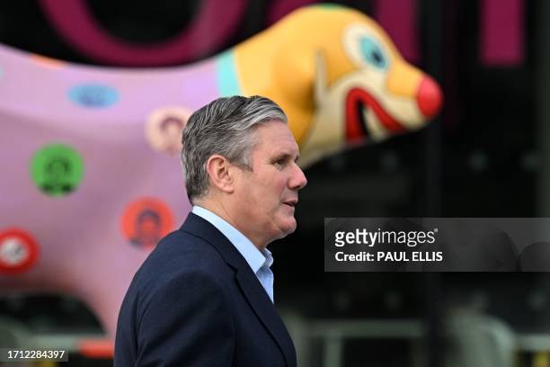 Britain's main opposition Labour Party leader Keir Starmer arrives for an interview with the BBC on the first day of the annual Labour Party...