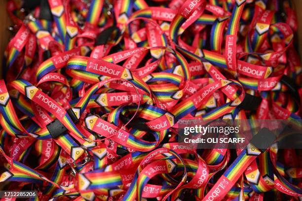Labour Party rainbow cloured lanyards are pictured on the first day of the annual Labour Party conference in Liverpool, north west England on October...