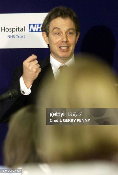 British Prime Minister Tony Blair talks to doctors and nurses at St. Thomas's Hospital 29 February 2000, after opening a one million pound upgraded...