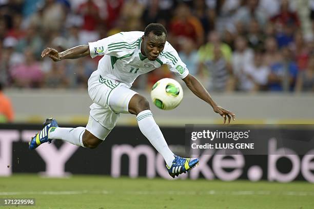 Nigeria's forward Muhammad Gambo tries to score against Spain during their FIFA Confederations Cup Brazil 2013 Group B football match, at the...
