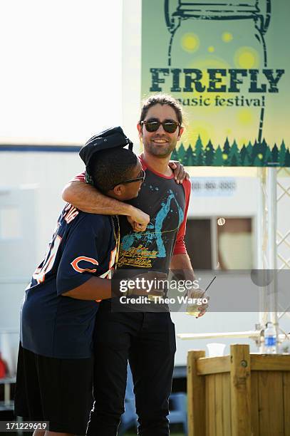 Reef Mckeithan and Adrian Grenier hang out at the Artist Compound at the Firefly Music Festival at The Woodlands of Dover International Speedway on...