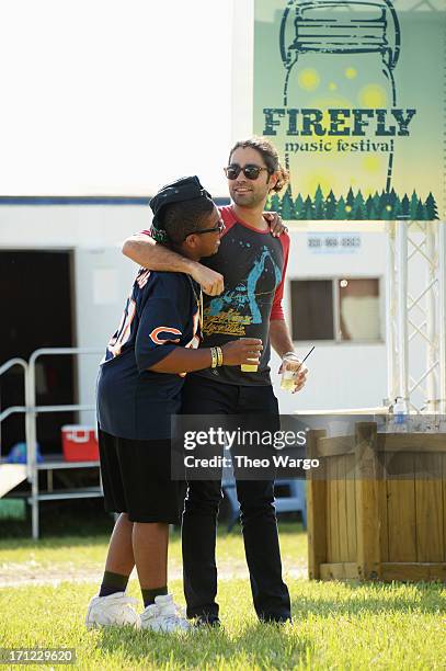 Reef Mckeithan and Adrian Grenier hang out at the Artist Compound at the Firefly Music Festival at The Woodlands of Dover International Speedway on...