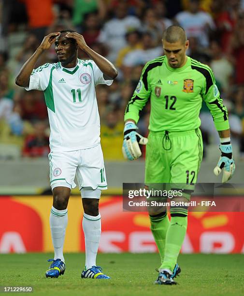 Victor Valdes of Spain looks on as Mohammed Gambo of Nigeria reacts after a missed chance during the FIFA Confederations Cup Brazil 2013 Group B...