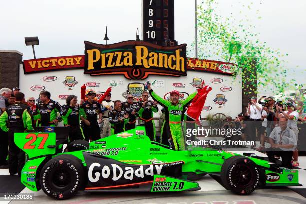 James Hinchcliffe of Canada driver of the GoDaddy Andretti Autosport Chevrolet celebrates in victory lane following his victory in the Iowa Corn Indy...