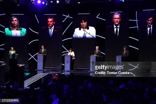 Presidential candidates stand on stage during a presidential debate on October 01, 2023 in Santiago del Estero, Argentina. Argentinians will head to...
