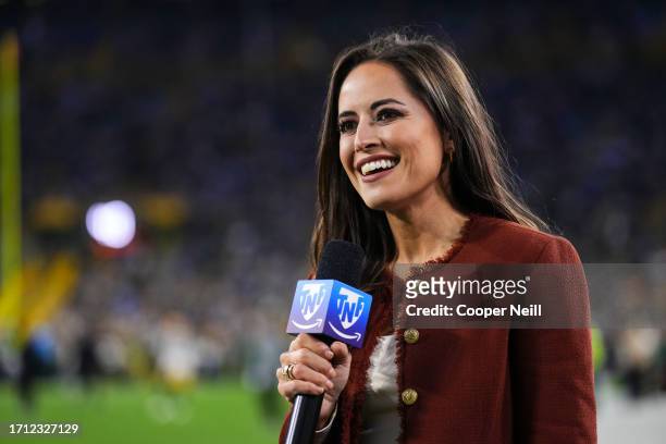 Kaylee Hartung looks on from the sideline prior to an NFL football game at Lambeau Field on September 28, 2023 in Green Bay, Wisconsin.