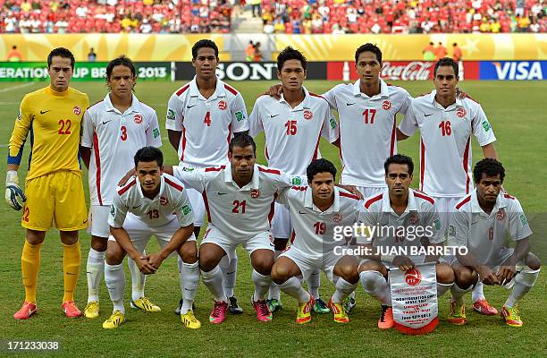 Tahiti's squad poses for pictures before the start of the FIFA Confederations Cup Brazil 2013 Group B football match against Uruguay, at the...