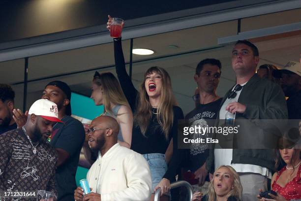Singer Taylor Swift cheers prior to the game between the Kansas City Chiefs and the New York Jets at MetLife Stadium on October 01, 2023 in East...