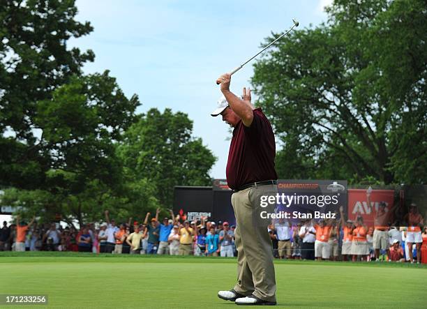 Craig Stadler reacts to his putt on the 18th green winning the final round of the Encompass Championship at North Shore Country Club on June 23, 2013...