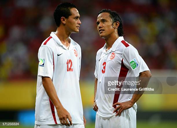 Edson Lemaire and Marama Vahirua of Tahiti look on during the FIFA Confederations Cup Brazil 2013 Group B match between Uruguay and Tahiti at Arena...