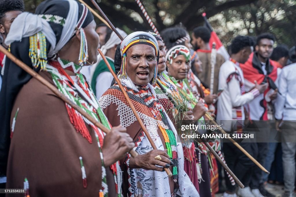 Ireecha Oromo people dressed in traditional attires gather on the shores of ...