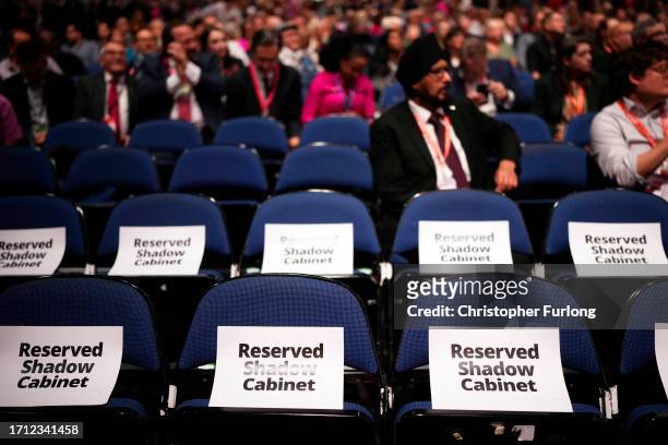 Reserved seats for the shadow cabinet in front of delegates on day one of the annual Labour party conference on October 08, 2023 in Liverpool,...