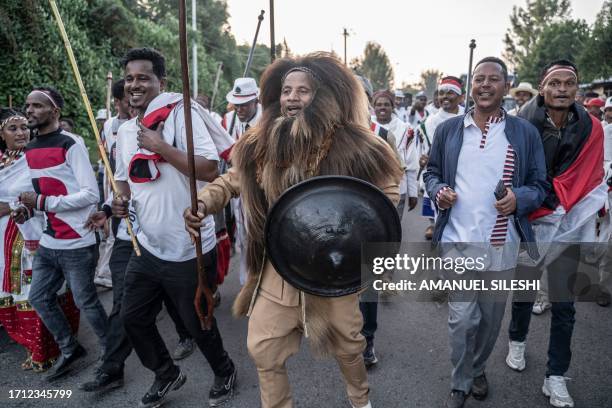 Oromo people dressed in traditional attires gather on the shores of lake Hora Arsadi during the celebration of "Irreecha", the Oromo people...