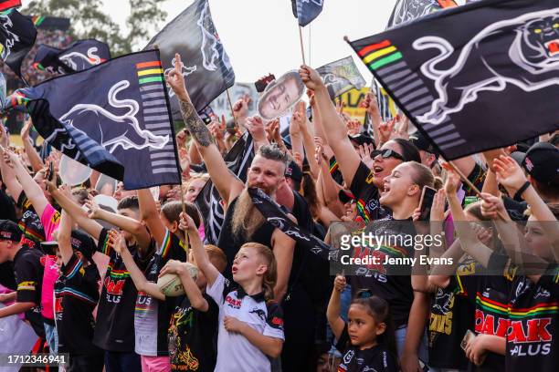Fans cheer during the Penrith Panthers NRL Grand Final celebrations at BlueBet Stadium on October 02, 2023 in Penrith, Australia.
