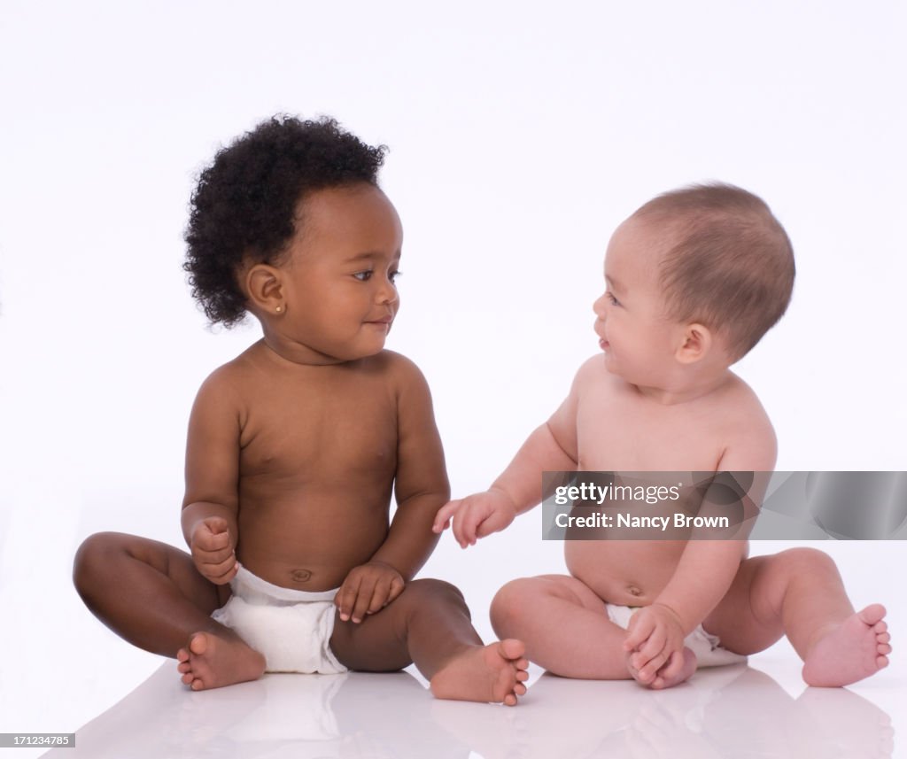 African American & Asian Baby on white.