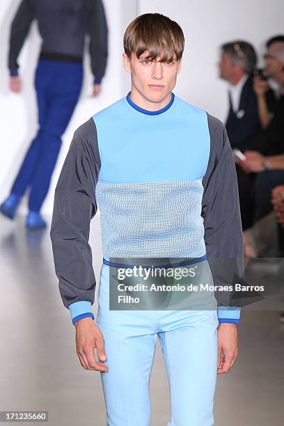 Model walks the runway during the Calvin Klein show as a part of Milan Fashion Week S/S 2014 on June 23, 2013 in Milan, Italy.