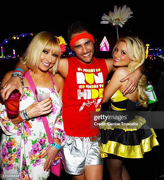 Tanya Popovich, Josh Strickland and Holly Madison during the 17th annual Electric Daisy Carnival at Las Vegas Motor Speedway on June 22, 2013 in Las...