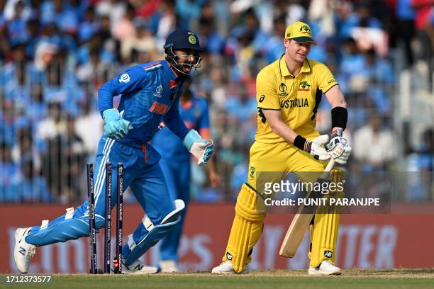 Australia's Steve Smith is clean bowled by India's Ravindra Jadeja as wicketkeeper KL Rahul reacts during the 2023 ICC Men's Cricket World Cup...