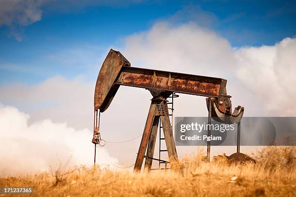 oil industry well pumps - oil well stock pictures, royalty-free photos & images