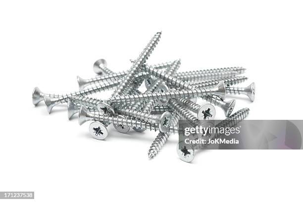 pile of screws - screw stock pictures, royalty-free photos & images