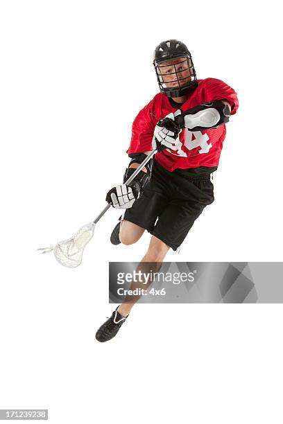 reproductor de lacrosse en acción - lacrosse fotografías e imágenes de stock