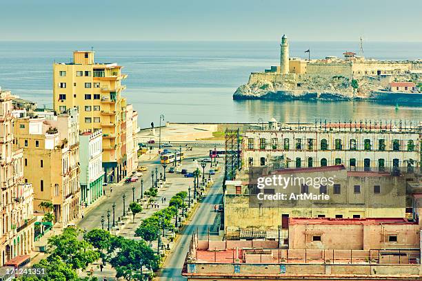 view to el prado and castillo del morro, havana, cuba - malecon stock pictures, royalty-free photos & images