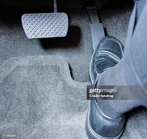 stepping on gas pedal - brake stock pictures, royalty-free photos & images