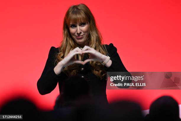 Britain's main opposition Labour Party deputy leader Angela Rayner gestures to the audience after she delivers a speech on the first day of the...