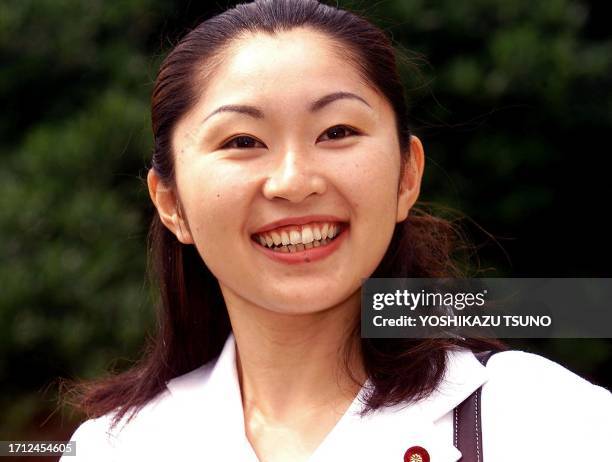 Yuko Obuchi, daughter of late Prime Minister Keizo Obuchi and newly elected Liberal Democractic Party member of the Lower House shows a big smile at...