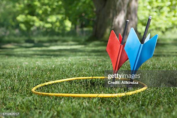 one each on target - dart stock pictures, royalty-free photos & images