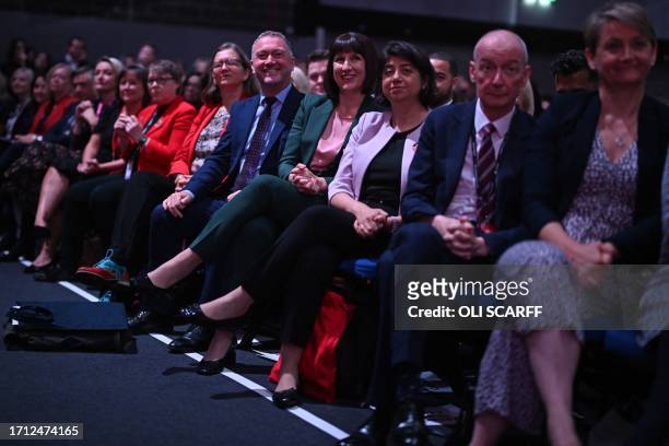Britain's main opposition Labour Party Shadow Chancellor of the Exchequer Rachel Reeves and members of the Shadow Cabinet listen as Britain's main...