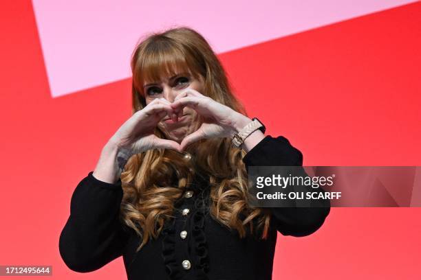 Britain's main opposition Labour Party deputy leader and Shadow Levelling Up, Housing and Communities Secretary Angela Rayner acknowledges the...