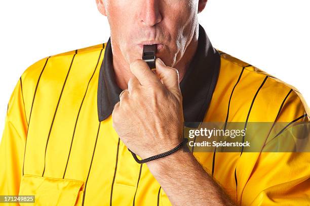 soccer referee blowing whistle - whistle stock pictures, royalty-free photos & images